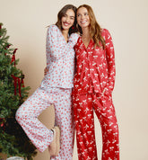 Millie Bobby Brown wears PJs with candy canes on them.