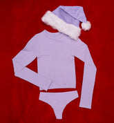 Millie Bobby Brown wears red knitted crop top and trousers